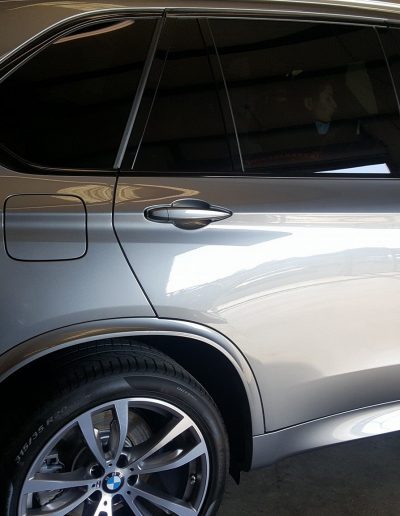 Refinished exterior on BMW X5 with ceramic coating and paint correction.